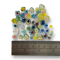 Glass beads, assorted colours, shapes and sizes. Striped lollipop mix. Made in India.