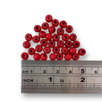 6mm wooden beads in Red. Sold in packs of 100 pieces, and available in a multi coloured or single colour packs. Craftworkz 6mm wooden beads have a hole size of approximately 2mm. Some slight variation in size is normal.