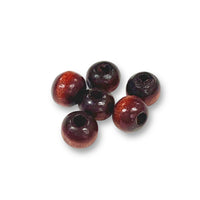 Craftworkz 6mm wooden beads in Brown. Sold in packs of 100 pieces, and available in a multi coloured or single colour packs. Craftworkz 6mm wooden beads have a hole size of approximately 2mm. Some slight variation in size is normal.