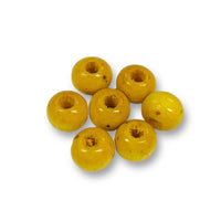 Craftworkz 6mm wooden beads in Yellow. Sold in packs of 100 pieces, and available in a multi coloured or single colour packs. Craftworkz 6mm wooden beads have a hole size of approximately 2mm. Some slight variation in size is normal.