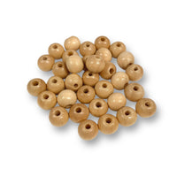 Craftworkz 8mm natural coloured wooden beads. Sold in packs of 100 pieces, and available in a multi coloured or single colour packs.  These 8mm wooden beads have a hole size of approximately 2mm. Some slight variation in size is normal.