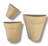 Three natural Kraft coloured paper mace plant half pots of different sizes on a white background