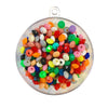A round container of multi coloured small plastic rondell beads on a white background