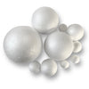 Assorted sizes of white polystyrene balls, also known as decofoam balls, against a white background.