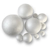 Assorted sizes of white polystyrene balls, also known as decofoam balls, against a white background.
