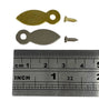 A brass photo turn alongside a metal ruler and screws, used for scale.