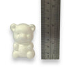 A white polystyrene 3D teddy bear shape on a white background with a ruler for scale.