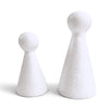 Two white foam decorative pawns shaped like stylized figures with round heads and cone-shaped bodies, shown on a clean white background.