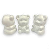 A set of 3 white polystyrene or decofoam sitting 3D teddy bear shapes on a white background