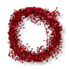 A wired star garland made up of red colored star-shaped elements coiled into a circle on a white background.
