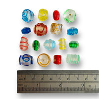Assorted glass beads in a clear striped mix.