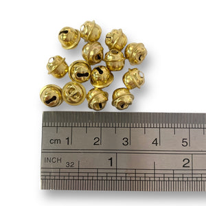 Craftworkz metal jingle bells in 8mm gold. Sold in packs of 100 pieces.
