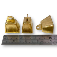 38mm rectangular shaped cow bell by Craftworkz. Metal, brass coloured cow bells available in 3 sizes . All sizes make a ringing sound.