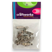 A 20 piece pack of 20mm silver coloured brooch backs by Craftworkz.