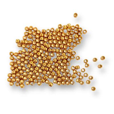 These gold coloured beading crimps measure approximately 2mm. They are soft metal beads used instead of tying knots to secure clasps and other beads onto un-knottable stringing material such as beading wire. Also available in silver or nickel coloured finish.