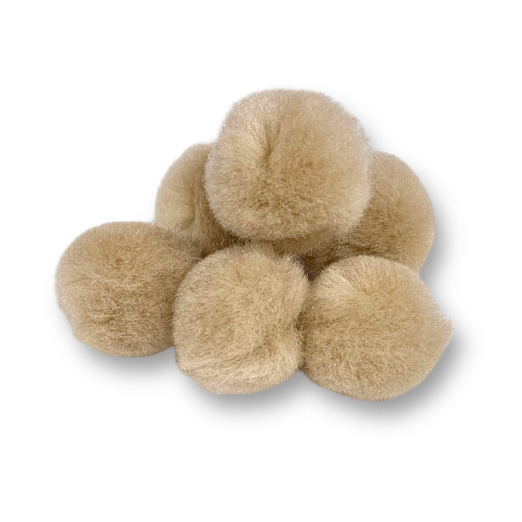 Craftworkz 20mm pom poms in Beige. Also available in a variety of single colour and multi coloured packs. These measure approximately 20mm in diameter and are sold in a 100 piece pack.