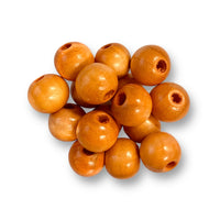 Wooden beads 18mm Orange in a 100 piece pack by Craftworkz.