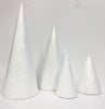 4 Polystyrene cones of different sizes on a white background
