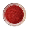 An open jar of red ultra fine glitter by Craftworkz