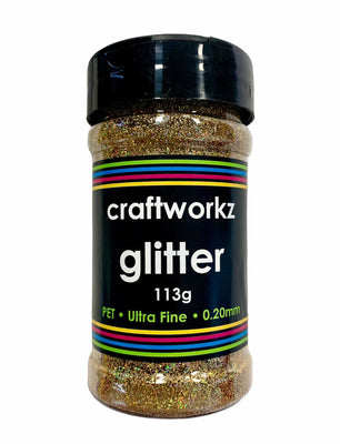A shaker jar containing ultra fine holographic glitter, with label indicating the brand, weight, and characteristics of the glitter.