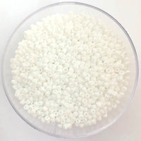 Craftworkz size 10/0 approx. 2mm glass seed beads in opaque white. Available in over 30 colours.