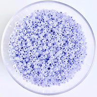 Craftworkz size 10/0 approx. 2mm glass seed beads in pearl lilac. Available in over 30 colours.