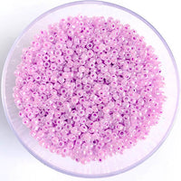 Craftworkz size 10/0 approx. 2mm glass seed beads in pearl mauve. Available in over 30 colours.