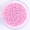 Craftworkz size 10/0 approx. 2mm glass seed beads in pearl pink. Available in over 30 colours.
