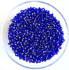 Craftworkz size 10/0 approx. 2mm glass seed beads in transparent royal blue. Available in over 30 colours.