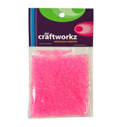 A pack of pink seed beads from Craftworkz brand, suitable for beading and jewelry making.