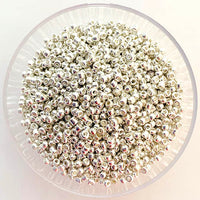 Craftworkz size 10 seed beads. Approximately 2mm diameter in colour option Metallic Silver.